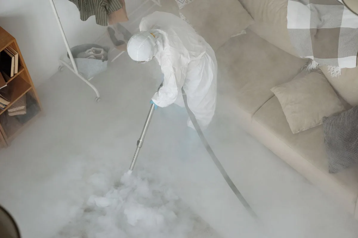 Biohazard cleanup technician in protective equipment, Carlstadt, NJ